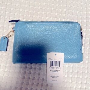 New coach wristlet Blue double zipper credit card slots gold hardware.